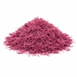Mexican Mimosa Hostilis Inner Root Bark shredded – fluffy deep magenta-pink fibrous pile on white background