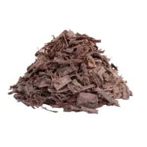 Brazilian Mimosa Hostilis Inner Root Bark Whole – coarse chopped dark brown bark chips and fibers piled on black background